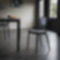 Stylish black metal dining chair in a modern setting