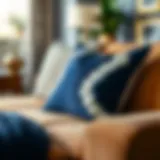Elegant navy and white pillow cover on a stylish couch