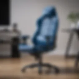 Ergonomic design of a blue gaming chair with speakers showing comfort and style