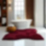Elegant design of a burgundy contour bath rug