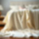 Luxurious oversized king muslin blanket draped elegantly over a bed